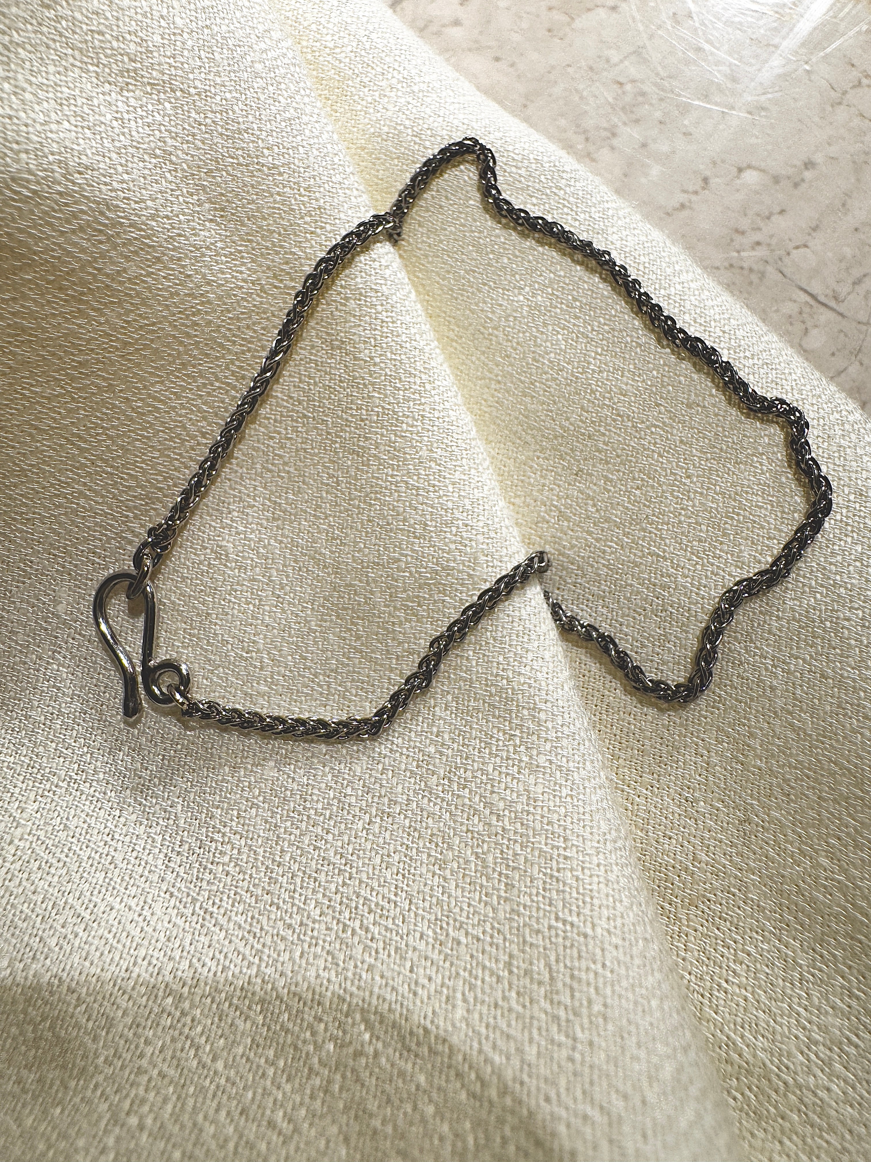Bracelet with S-clasp, white gold
