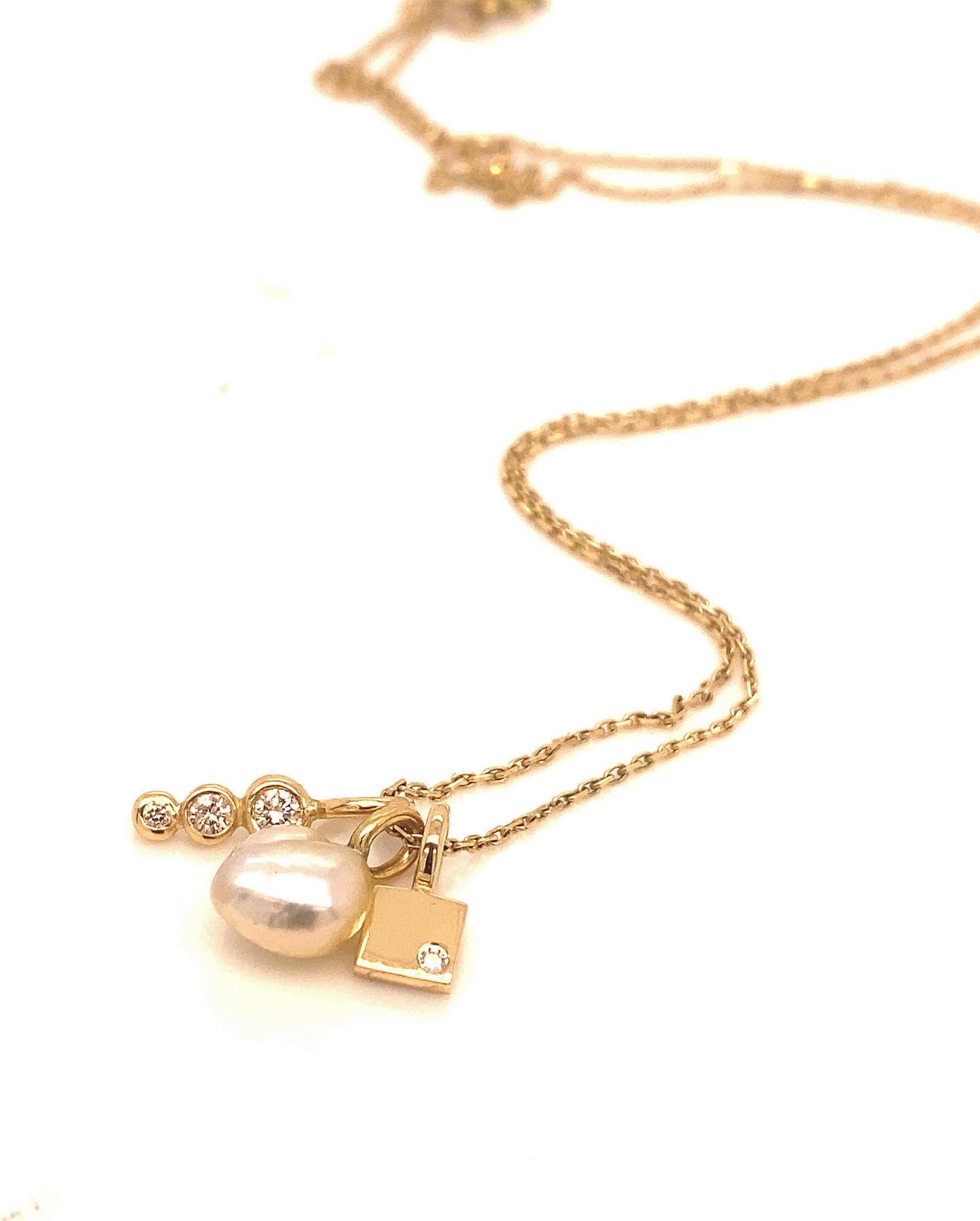 Square pendant, no.1, with white diamond in anchor-faceted chain