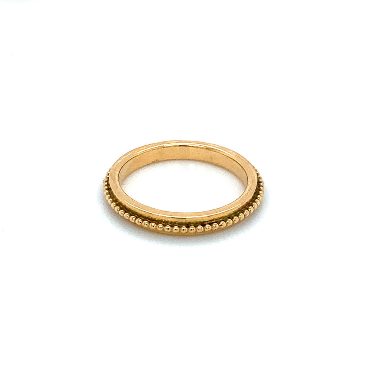 Ring with small gold balls